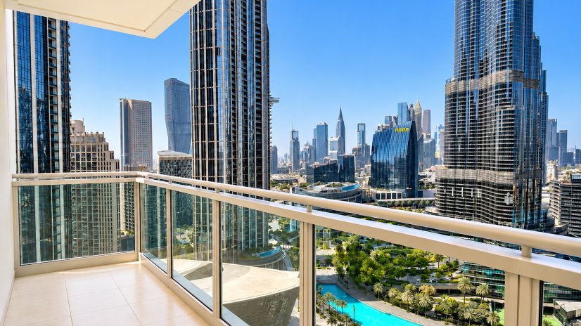 View from a Downtown Dubai apartment balcony towards Burj Khalifa and the surrounding towers